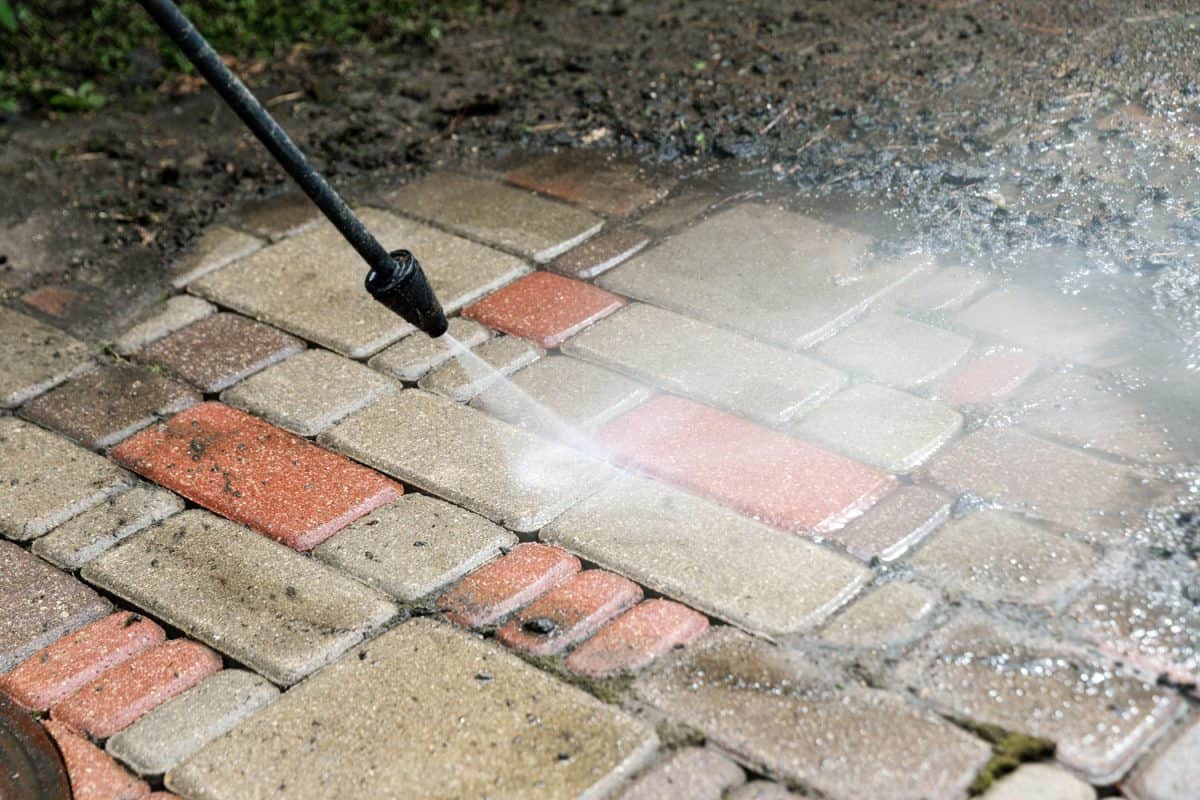 Pressure wash brick pavers